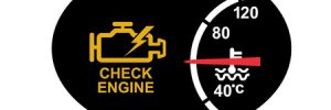 A check engine light is lit up on a dashboard