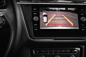 Car display and rear view camera. Parking assistant inside car. Video parking system in modern car.