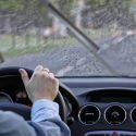 driver drives the car on a rainy day