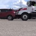 Volvo VNL Impacting Ford Escape rear end