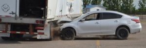 Nissan Altima hits Trailer Duals